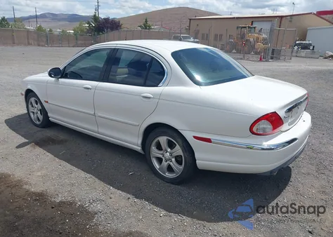 2002 Jaguar X-Type 3.0L из США, поврежденный, VIN SAJEA51C02WC42090